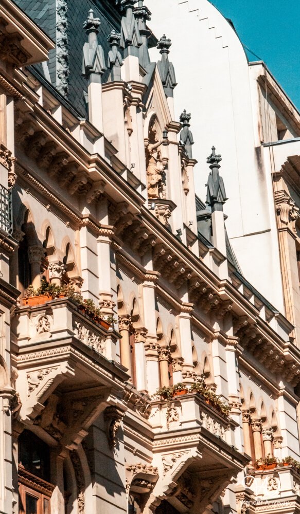 Ornate architectural details on a historic building in Bucharest Old Town.