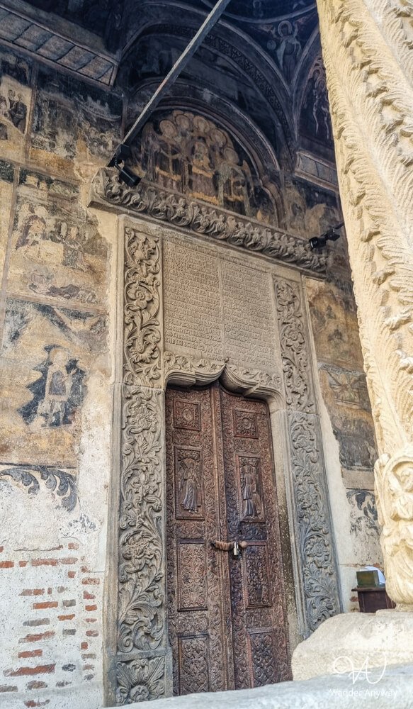 Decorated entrance of the Stavropoleos Church in Bucharest Old Town.
