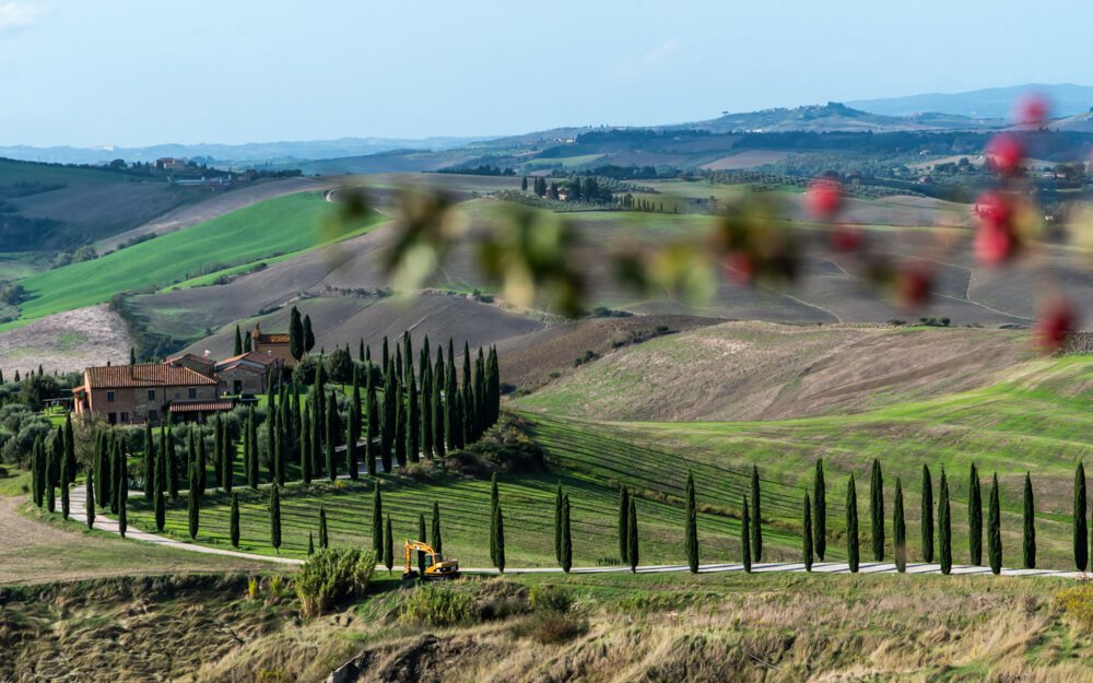 Rolling hills and cypress trees – classic Tuscany road trip landscape