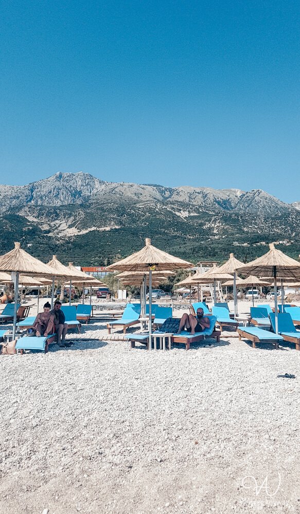 Sunbeds and umbrellas at Drimadhë Beach, Albania