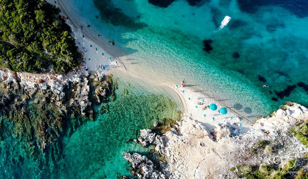 Turquoise waters and sandy shores at Isole Gemelle di Ksamil, Albania