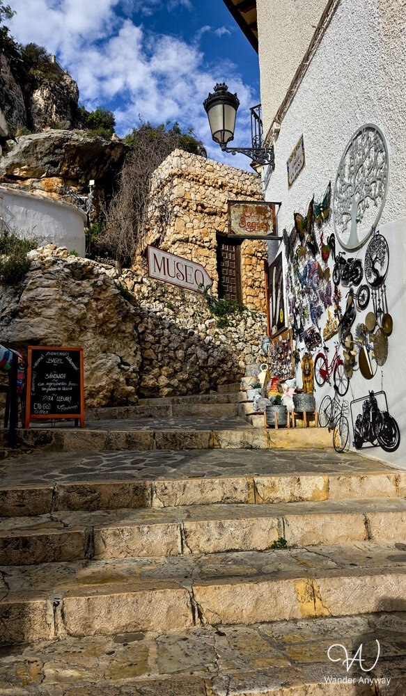 Decorative stone staircase leading through Guadalest’s old town.