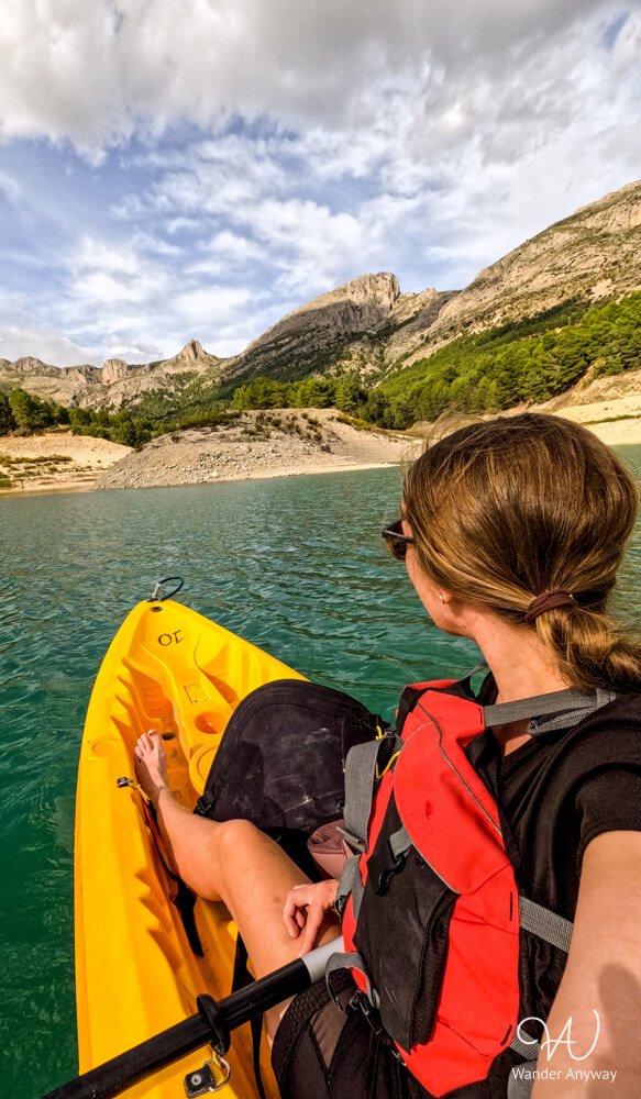 Kayaking on the bright turquoise waters of the Guadalest Reservoir.