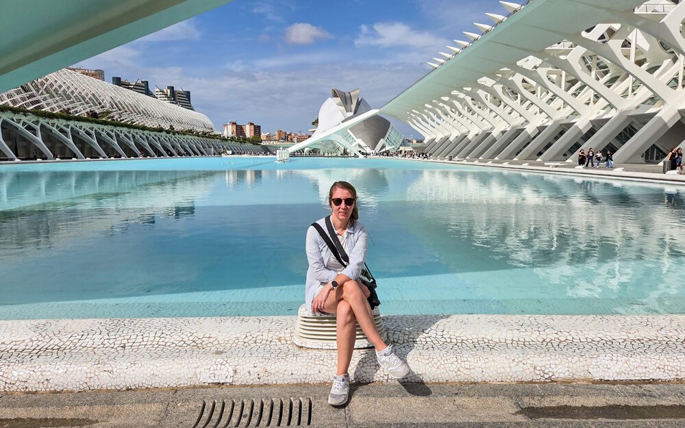 Me sitting beside the turquoise pools of Valencia’s City of Arts and Sciences.