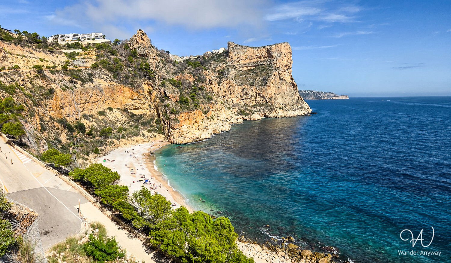 View of Cala del Moraig, one of the best Costa Blanca beaches, surrounded by limestone cliffs